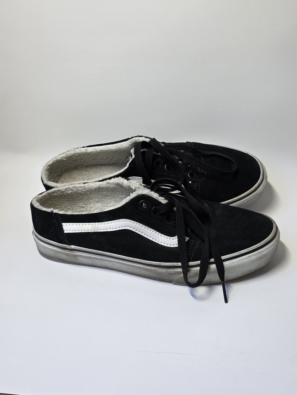 Vans Black Suede Low-Top Sneakers with White Stripe and Cream Sherpa Lining